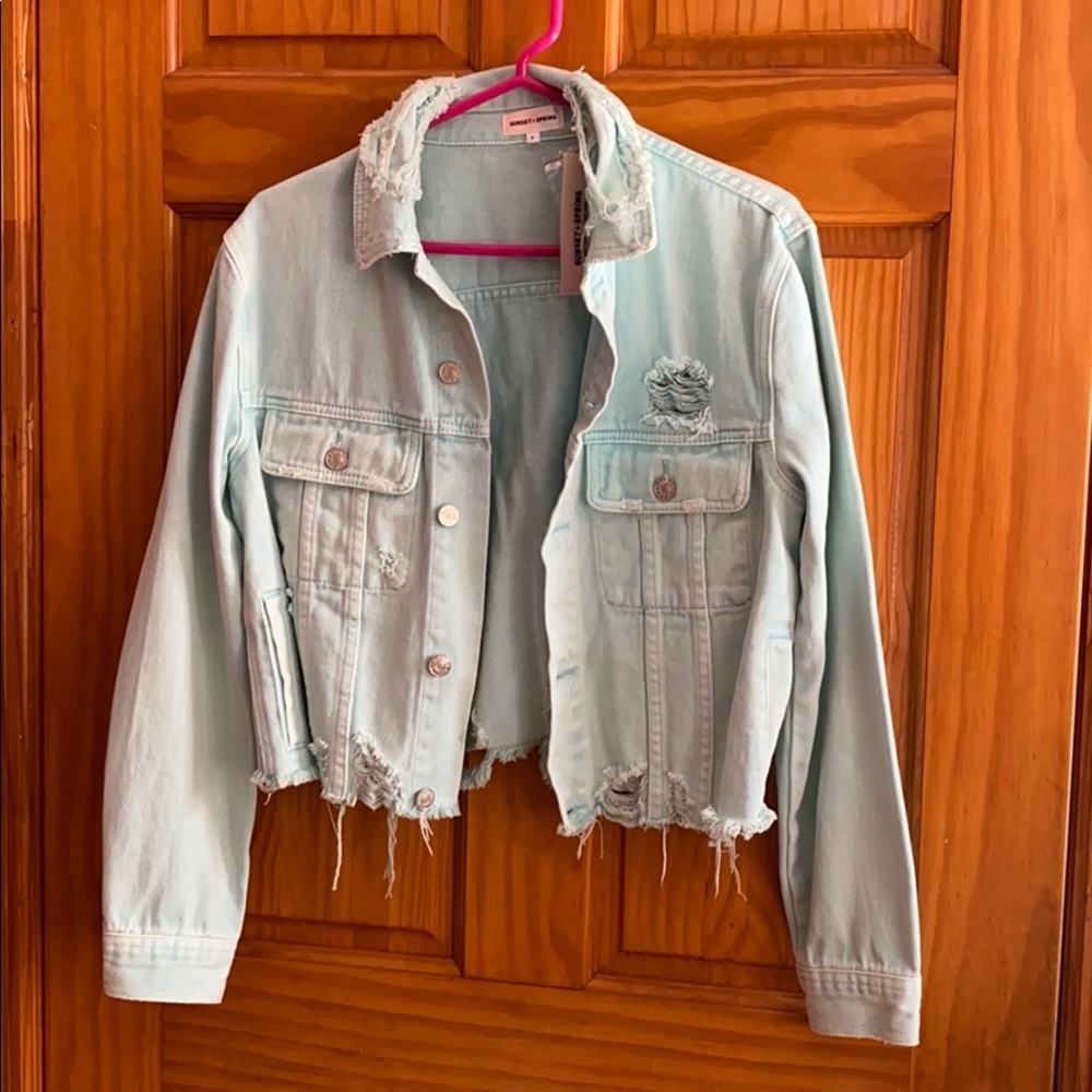 Distressed denim jacket